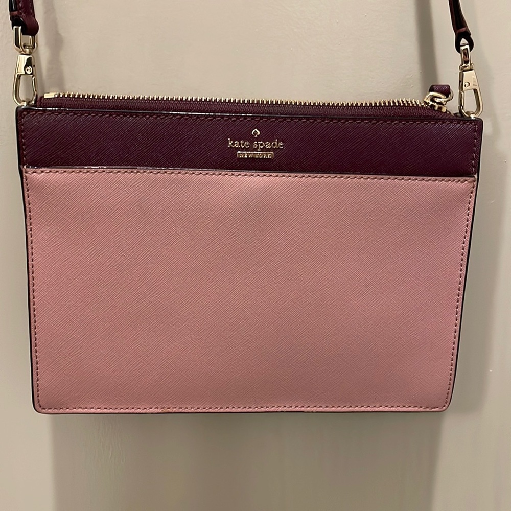 Kate Spade two tone pink over the shoulder purse with adjustable strap.
